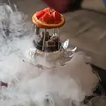 Shisha pipe with fruit and smoke at Shisha Break.